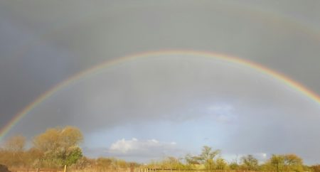 Rainbow over Respect woodland green burial park