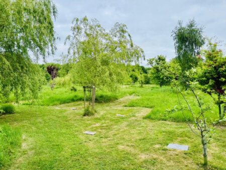 Unattended funeral burial plots and beautiful view of countryside at Respect Funeral Services.