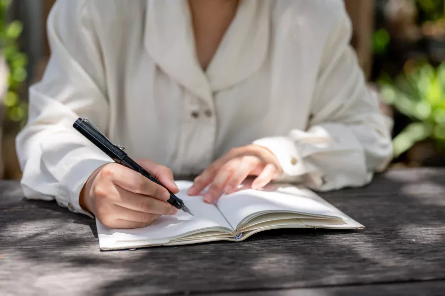 People gathered at Respect funeral service waiting for eulogy to be read.